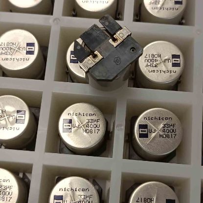 UUJ2G330MRL1ZD 33MF 400V 18x21.5 NICHICON SMD KONDANSATÖR resmi