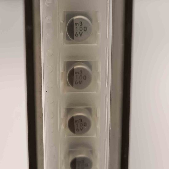 UWX0J101MCL1GB 100MF NICHICON SMD KONDANSATÖR resmi