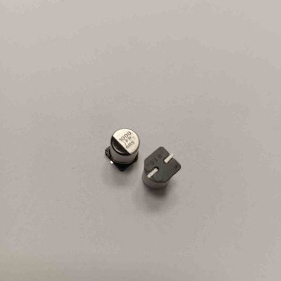 1000JFP6R5 1000MF SMD KONDANSATÖR resmi